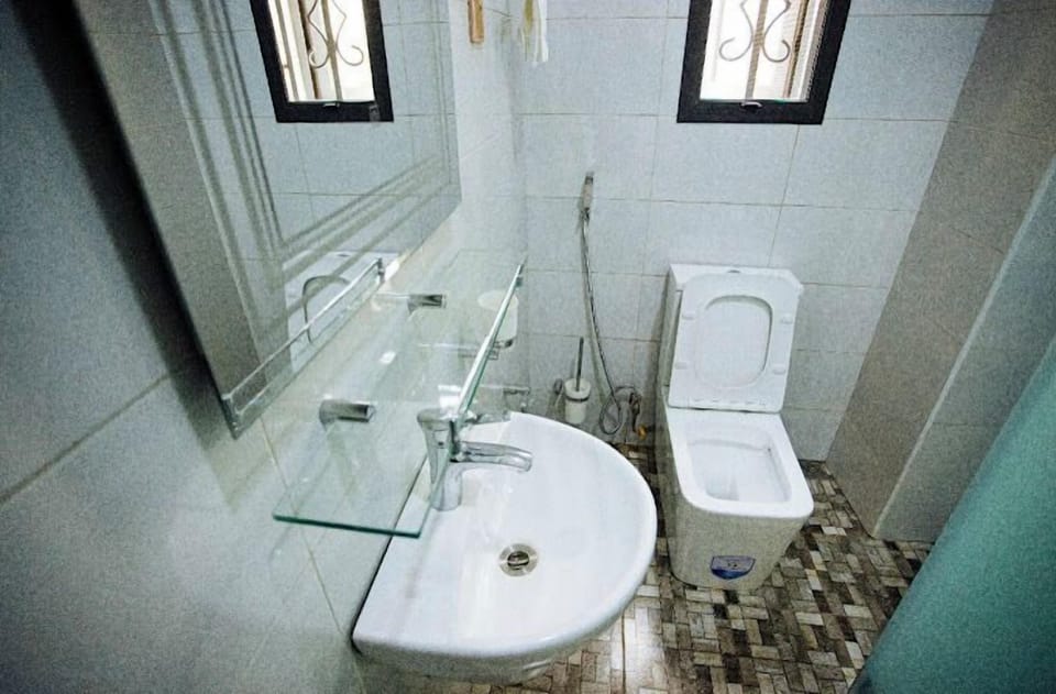 Family Room, Balcony, City View | Bathroom | Free toiletries, hair dryer, towels, soap
