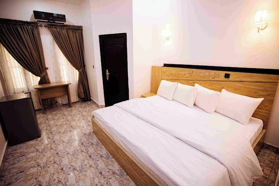 Family Room, Balcony, City View | Desk, laptop workspace, free WiFi