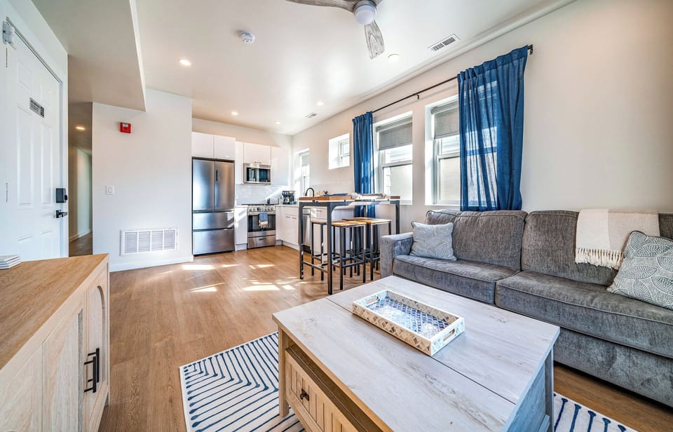 Inviting living space with comfortable seating and a fully equipped kitchen