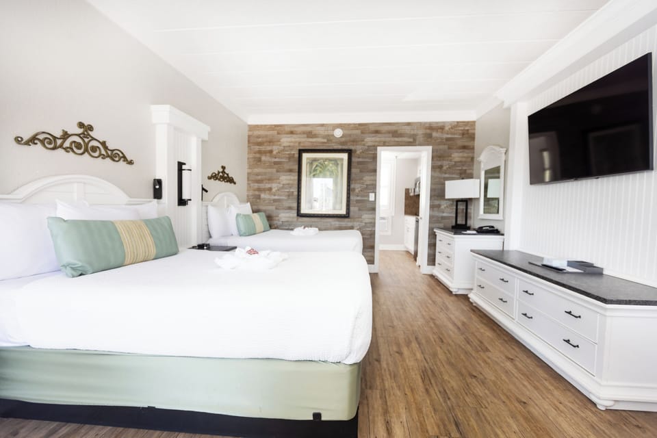 2 Double Beds, Kitchenette, Pool View, Ground Floor Exterior Entrance | Premium bedding, pillowtop beds, in-room safe, blackout drapes