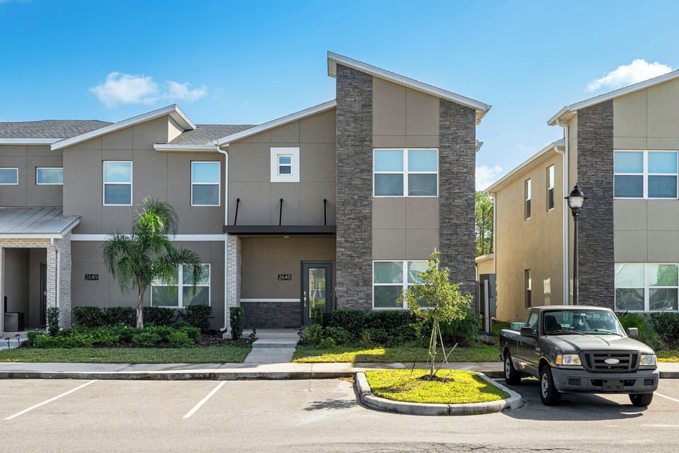 Townhouse front with modern style and architectural charm.