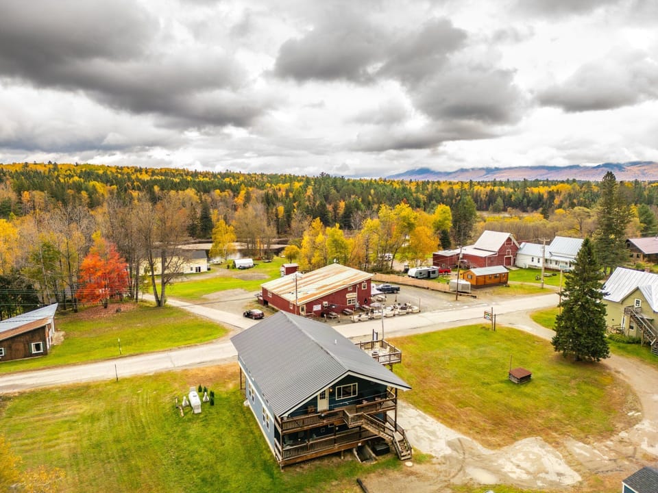 From the air: The Chalet, Trails End Steakhouse, and the mountain range behind