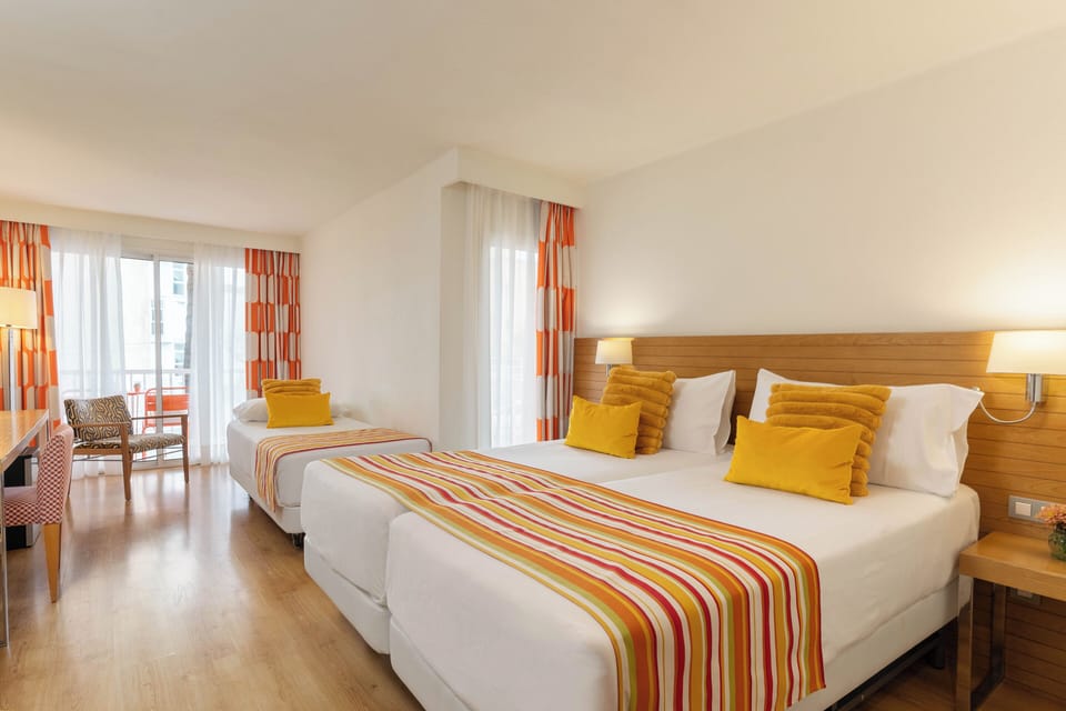 Comfort Room (Extra Bed 3 adults) | Minibar, in-room safe, desk, laptop workspace