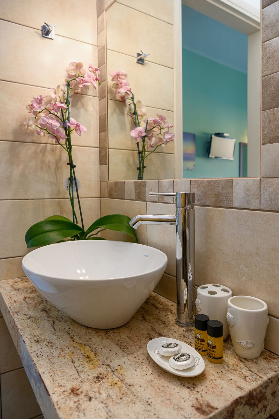 Shower, hair dryer, slippers, towels