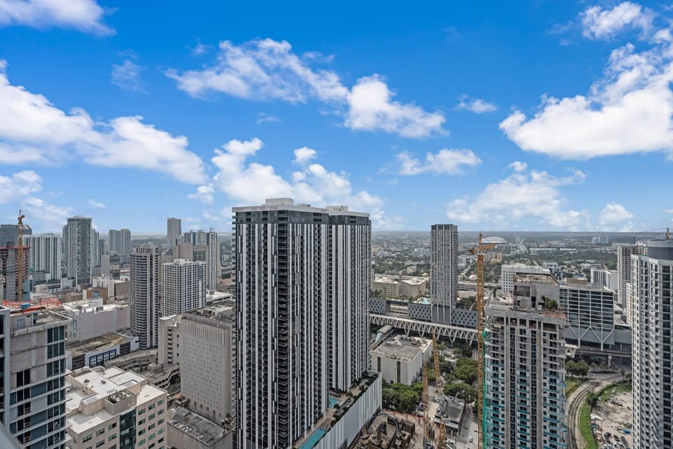 The city's energy unfolds beneath you from this stunning vantage.
