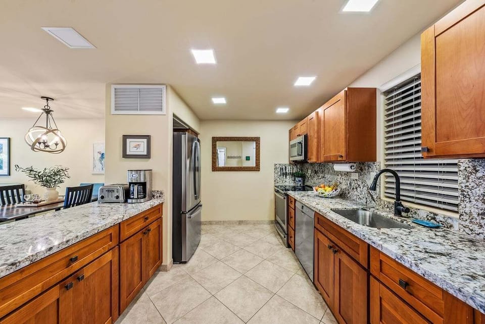 Enjoy cooking at your fully furnished kitchen with stainless steel appliances