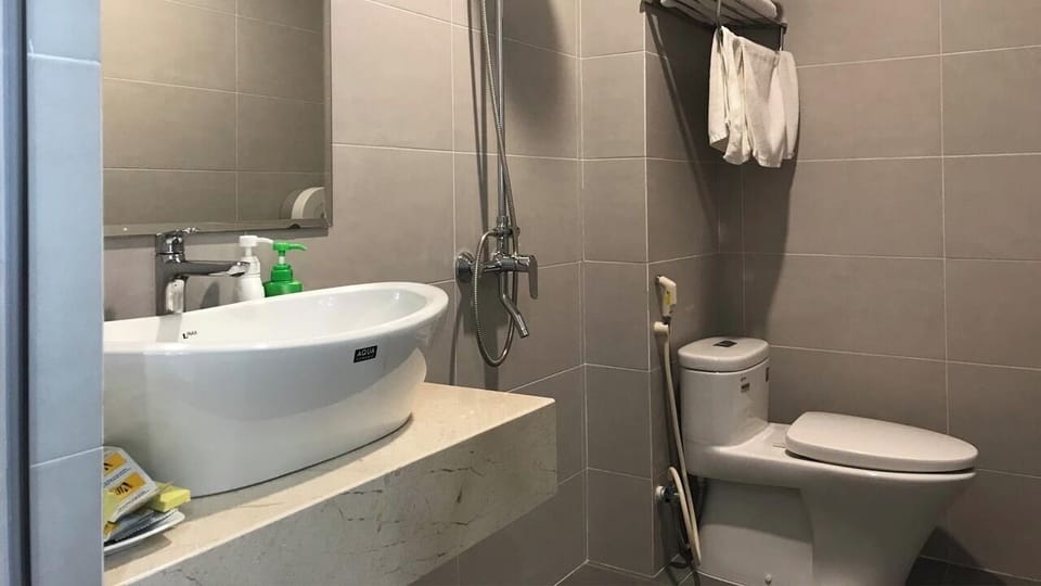 Shower, free toiletries, hair dryer, slippers