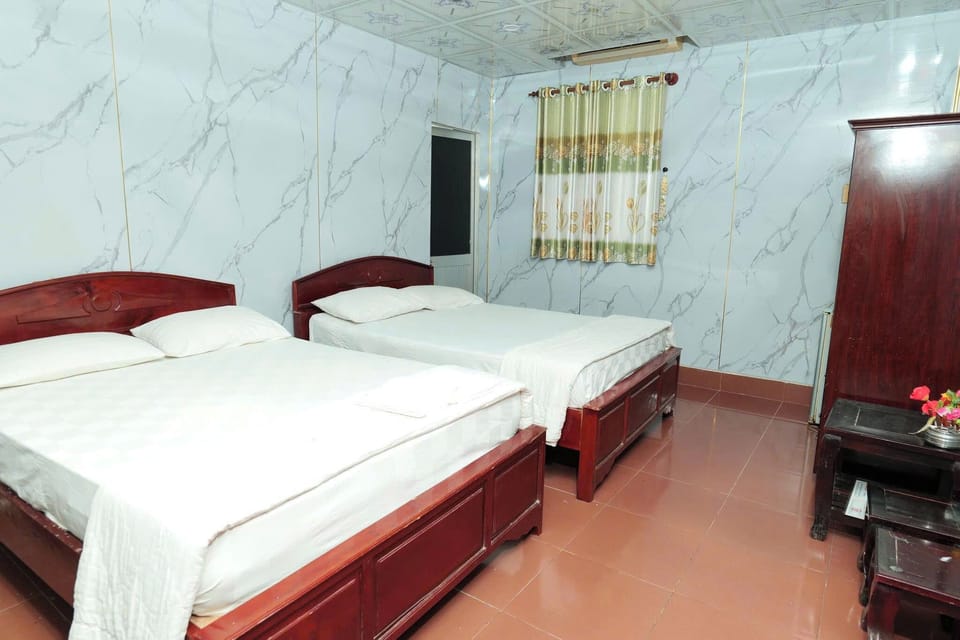 Standard Quadruple Room, City View | Iron/ironing board (on request), WiFi (free)