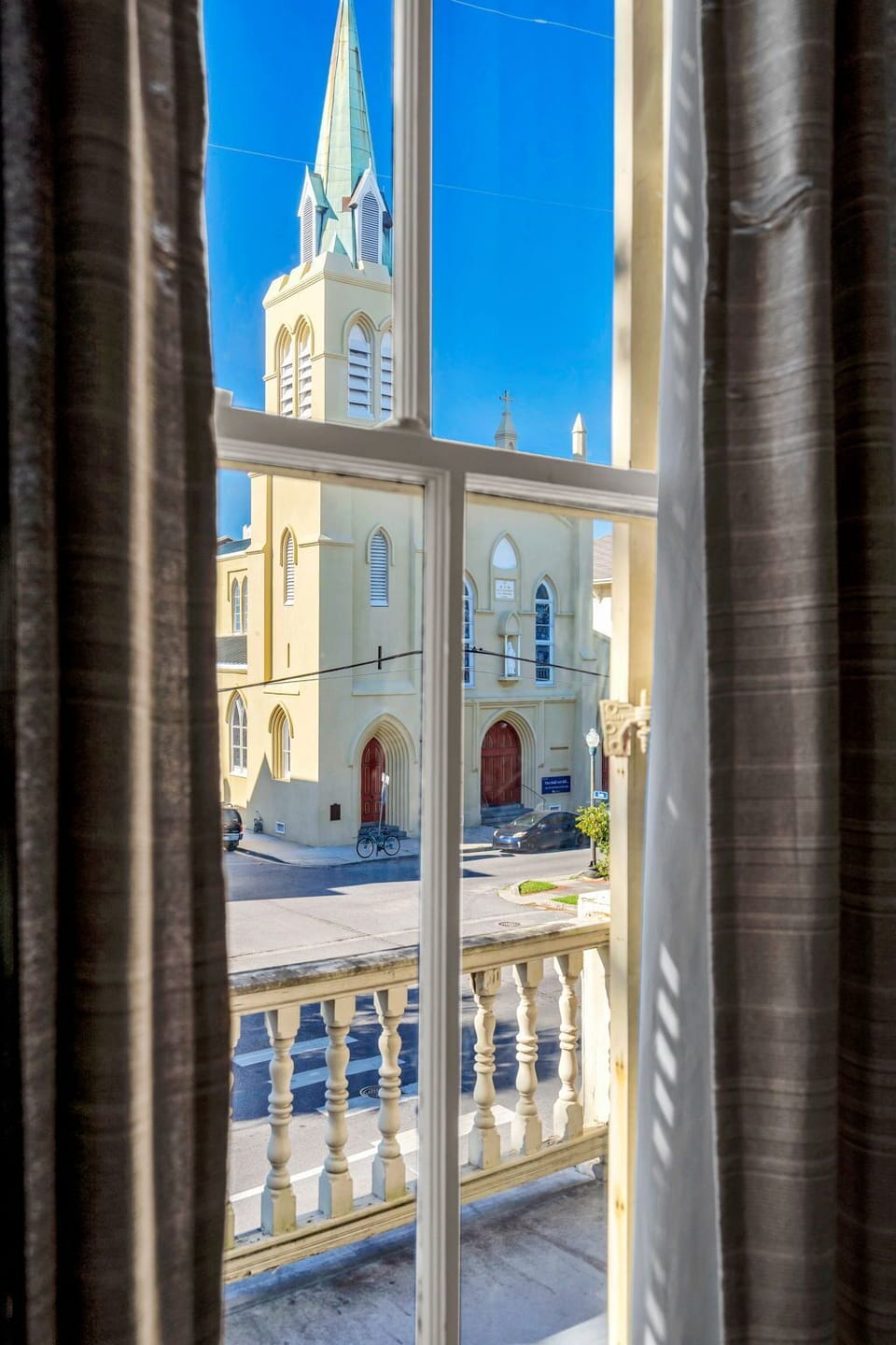 Step through grand glass doors onto a private outdoor space full of charm.

