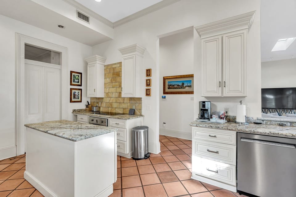 A chef's dream — granite countertops, stainless steel appliances & historic charm.
