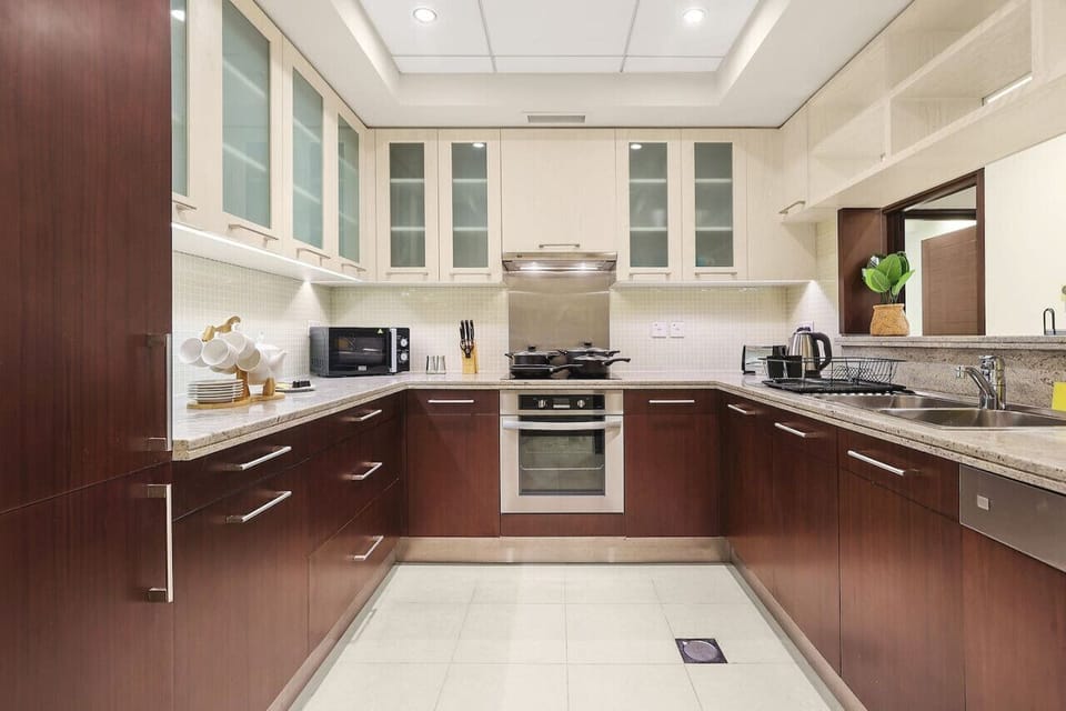 Kitchen: Cook up a storm in this stylish space with modern appliances and sleek finishes!
