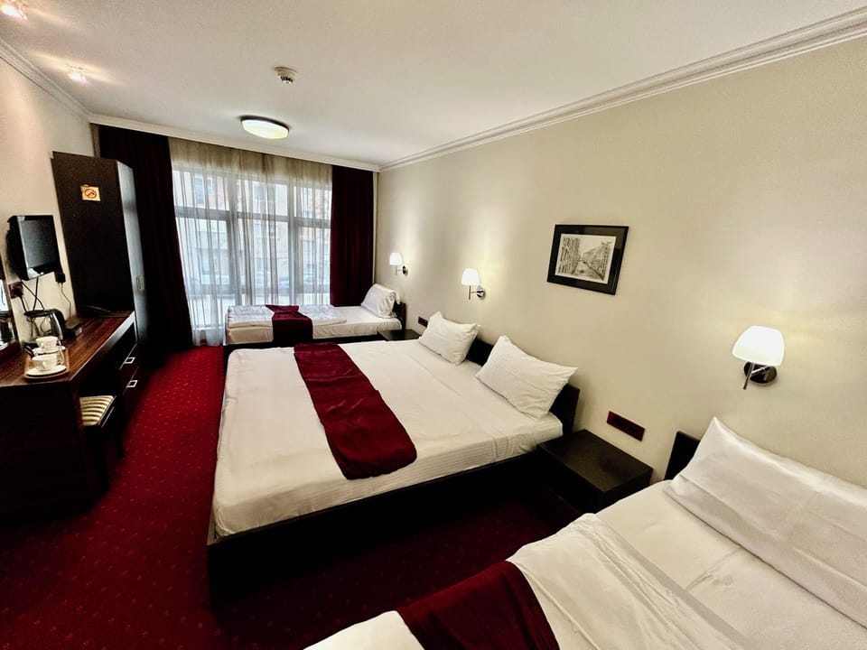Classic Quadruple Room | Desk, blackout drapes, soundproofing, free WiFi