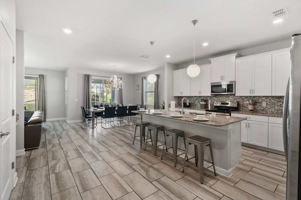 Cooking Amenities:  Fully equipped open kitchen with stainless steel appliances, large prep area, and everything you need to cook up meals for a crowd!