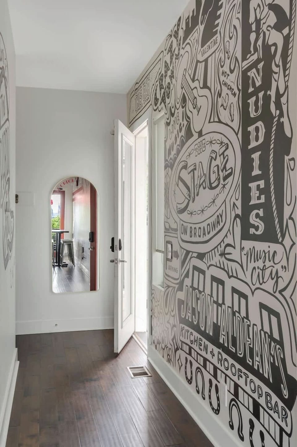 Step into Nashville's vibrant charm with unique murals and welcoming sunlight!