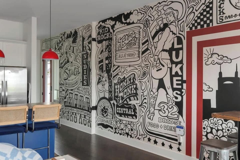 Explore Nashville's spirit with vibrant mural art and a stylish bar setup!