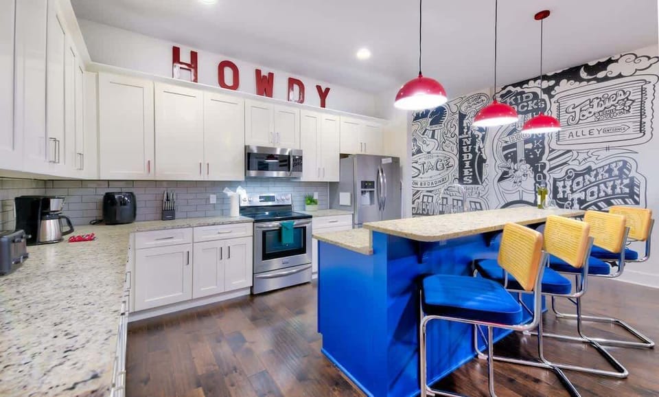 Bright and fun, featuring granite counters and vibrant mural art!