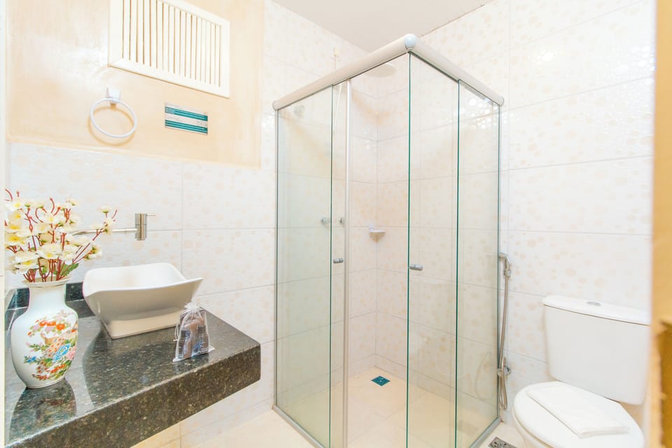 Standard Triple Room | Bathroom | Shower, towels, toilet paper