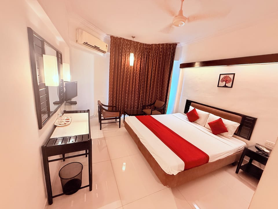 Deluxe Room, City View | Individually furnished, desk, laptop workspace, free WiFi