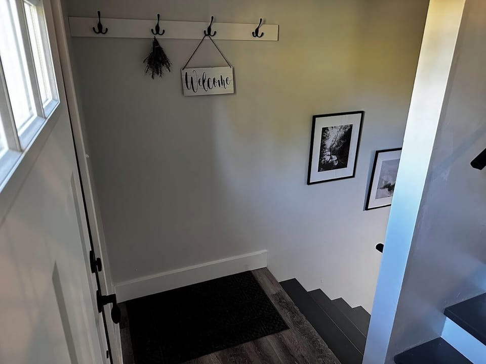 stairs to lower level from entrance landing 