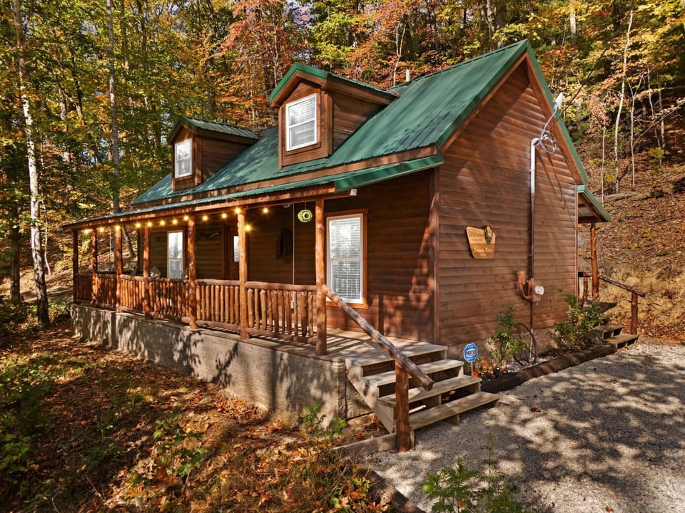 Cozy cabin retreat nestled in vibrant autumn woods