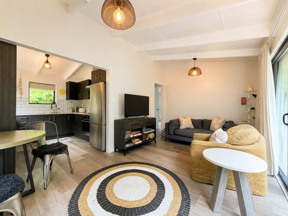 Open plan living dining area with TV 