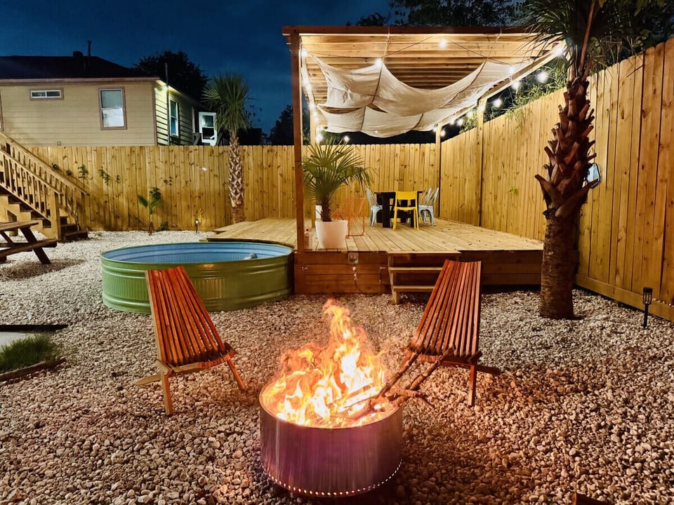 Fire Pit Area: Inviting spot to unwind around a cozy fire under the stars.