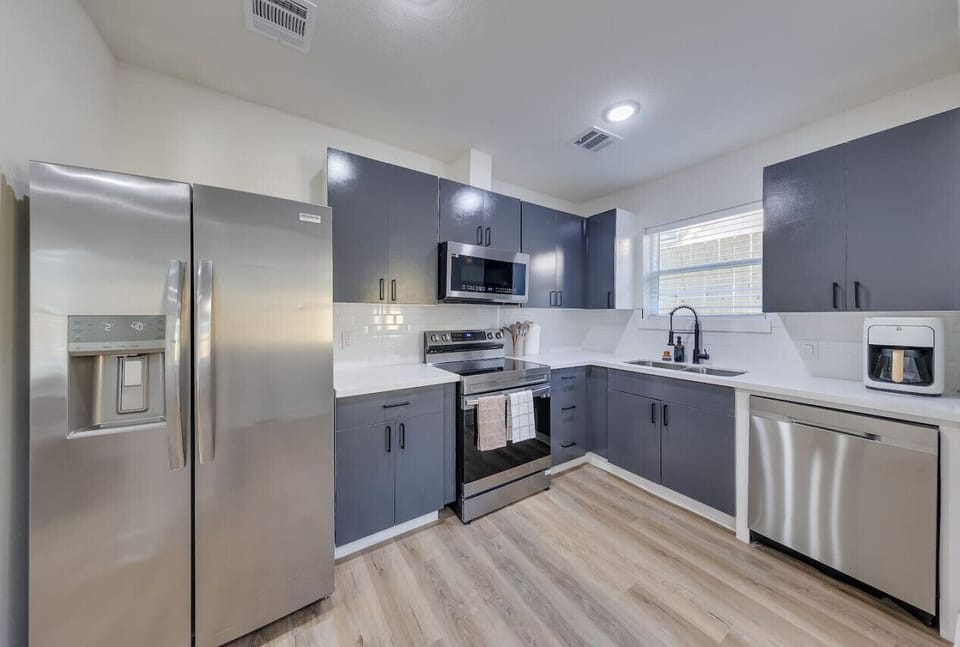 Kitchen: Fully equipped, modern kitchen with ample counter space and appliances for convenient meal prep.
