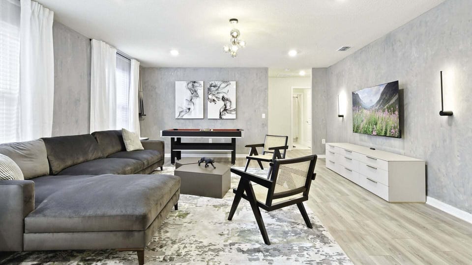 Our vacation rental offers the ideal entertainment for large groups of friends & family, featuring an extra TV room and pool table.