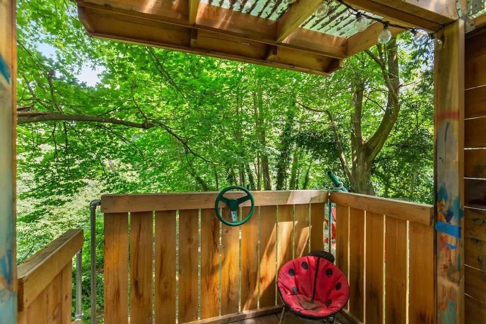 A quiet hideout in the trees. Kids can play pretend, read, or look out over the woods.