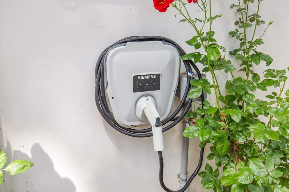 Charge your EV overnight before heading out. Located just off the driveway.