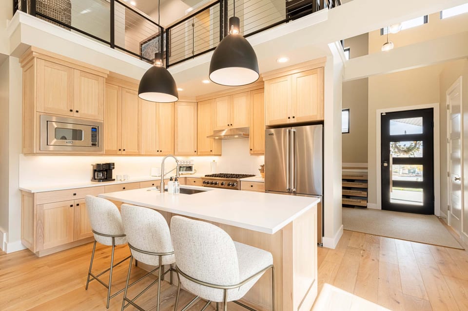 Gourmet kitchen and center island and bar seating