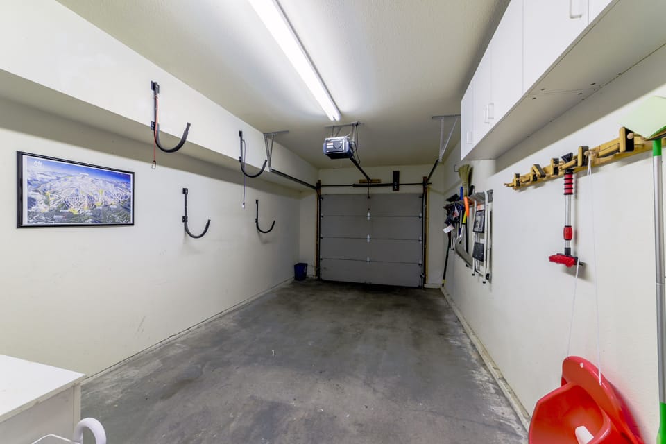 Private 1 car garage with extra equipment storage space
