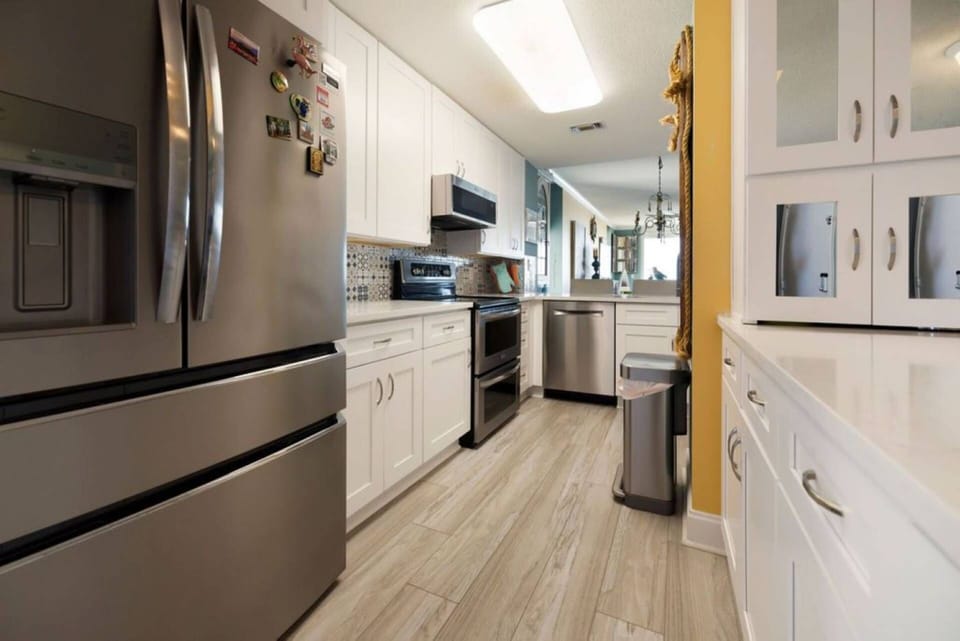 The kitchen is equipped with modern appliances