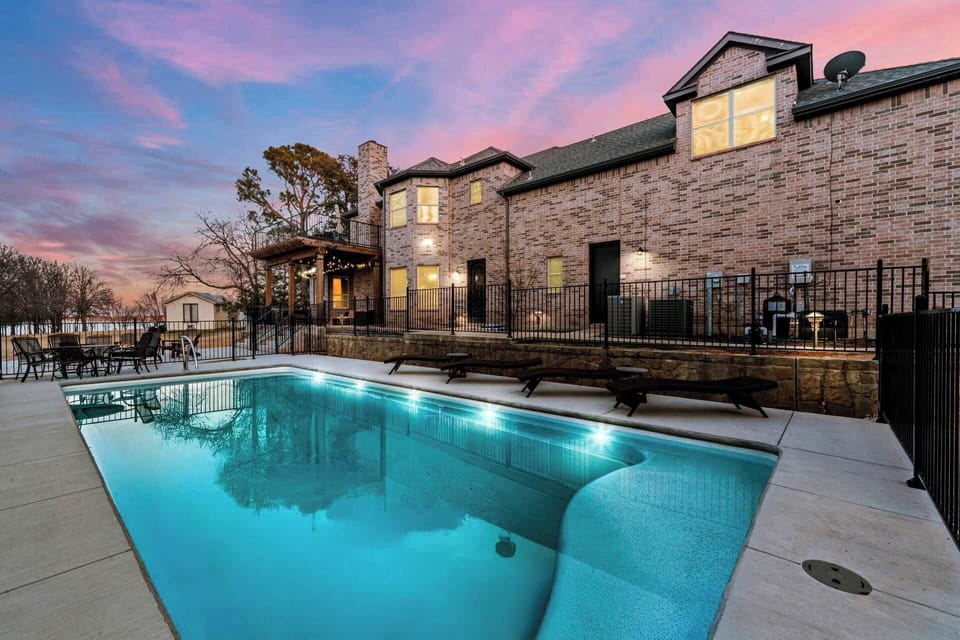 Let the glow of the pool guide you into evenings filled with laughter, relaxation, and memories.