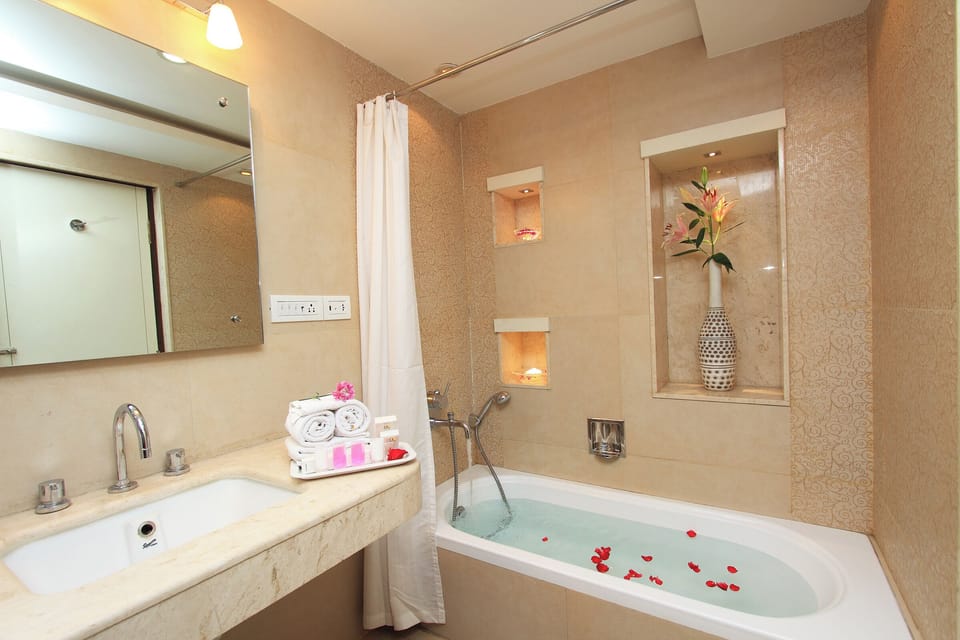 Premium Suite, 1 Bedroom, Accessible Bathtub, City View | Bathroom | Separate tub and shower, free toiletries, hair dryer, bathrobes