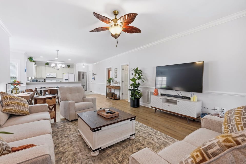 Enjoy the large and well designed living room with a view of the lake being you and easy access to everything in Myrtle Beach!