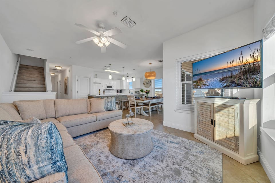 Large, Open Living Space with Stunning Gulf Views: Updated Kitchen w/ Counter-Height Seating for 6, Gulf View Dining Table (seating for 8), Large Sectional Sofa w/ Smart TV, & Private Balcony