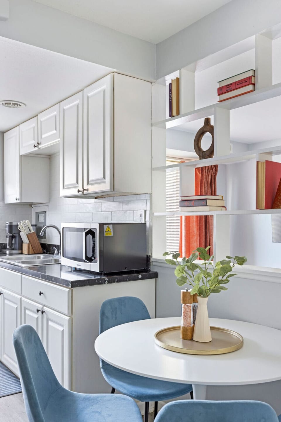 Sit down and enjoy a meal at our dining table conveniently located in the kitchen area