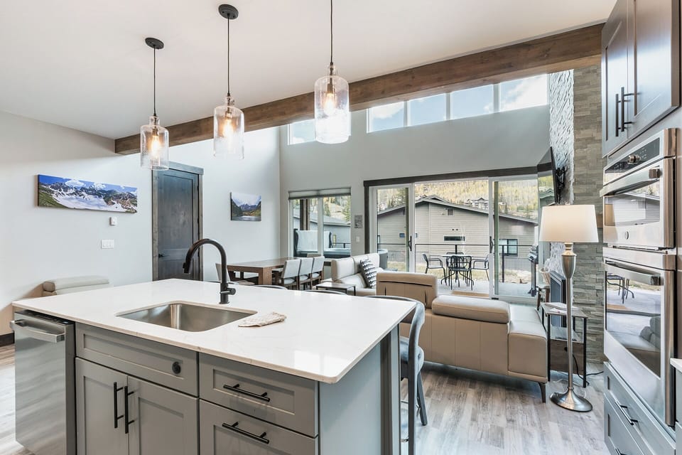 Main Living Space, Dining and Kitchen - Deck access and views - TV and Gas Fireplace