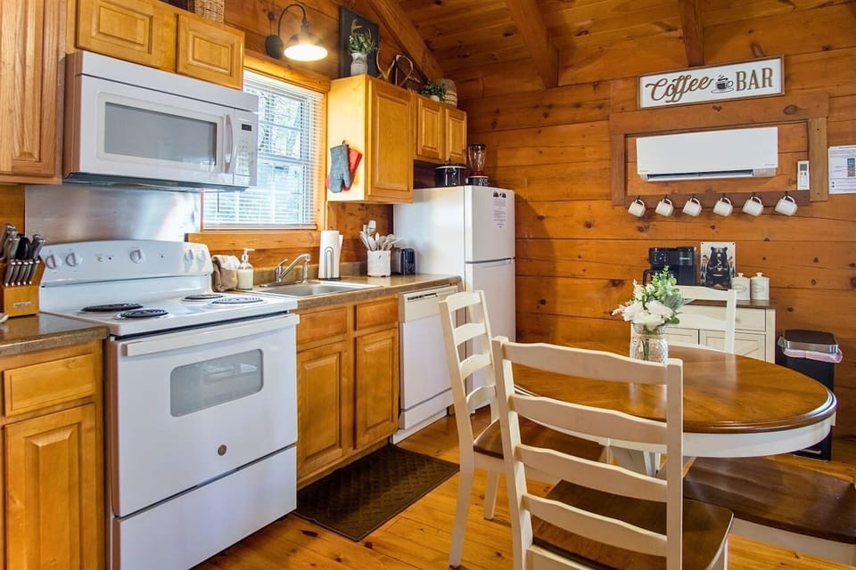 Cook breakfast together in the fully stocked kitchen, then carry plates to the dining table a few steps away. You'll feel like you actually live here, not just visit.