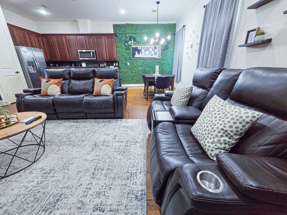 Relax on a leather reclining sofas in this intimate living room and take full advantage of your 75inch Smart TV, complete with several streaming services including Netflix, Hulu, Amazon Prime, and more.