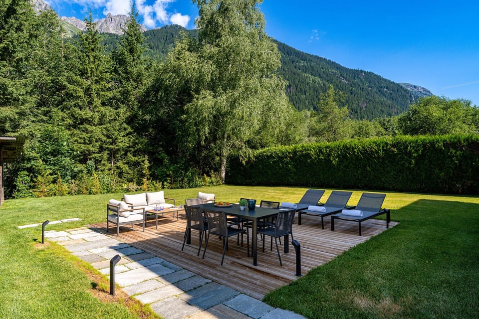Deck furnished to dine and lounge outdoors