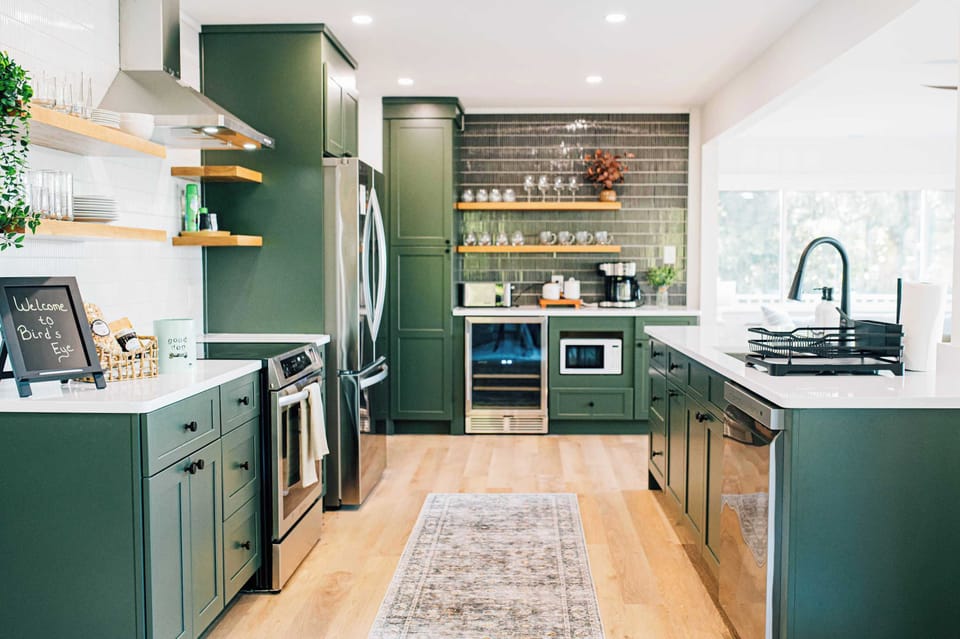 This just might be the cheeriest kitchen you'll ever experience! With wide open views of the water and easy conversing with guests sitting in multiple locations, it's the heart of the home. Bonus wine fridge keeps your bottles at perfect temperature.
