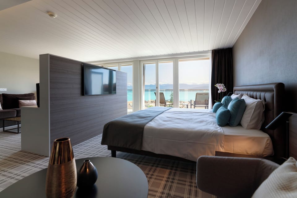 Suite, Balcony, Lake View | Minibar, in-room safe, desk, blackout drapes