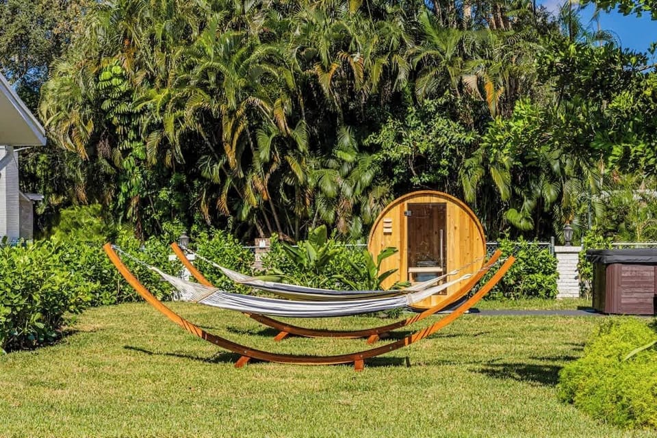  Relax, unwind, repeat. Between the hammocks, hot tub, and sauna, every moment here is designed for ultimate relaxation.