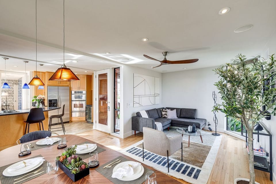 Living Room features a L-shape sofa, TV w/ cable and home theater sound system