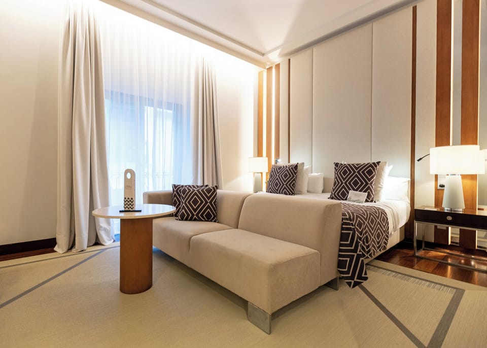 Premium bedding, down comforters, memory foam beds, minibar