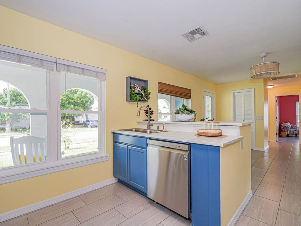 Doing dishes is easy with happy colors, sunshine, and dishwasher