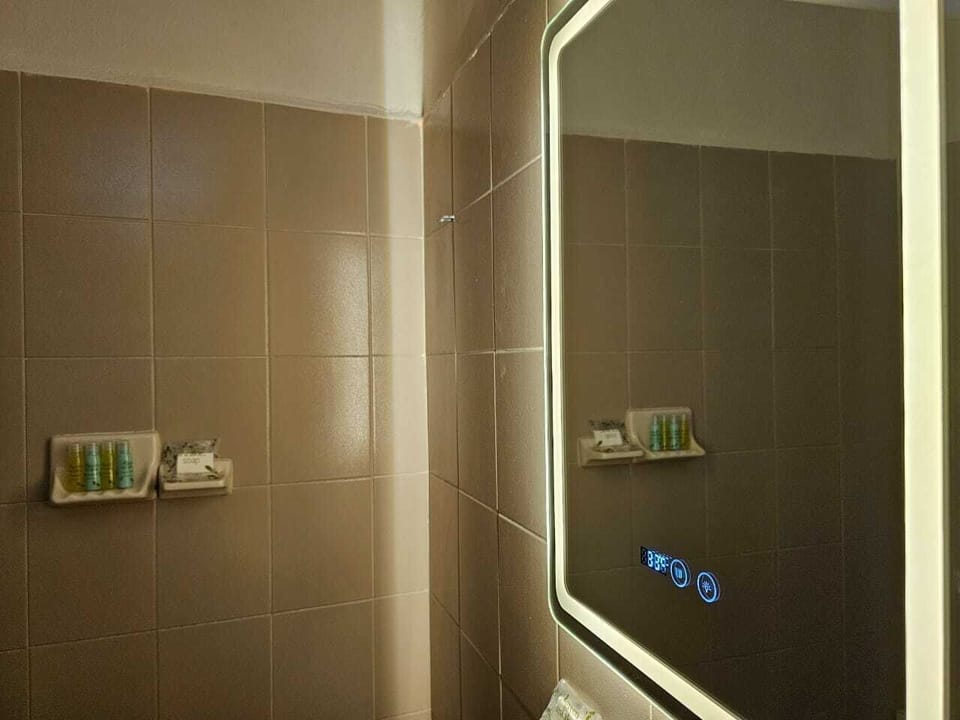 Shower, free toiletries, towels, soap