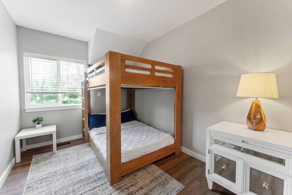 The upstairs bunk room has 2 full sized mattresses that are perfect for additional guests or makes a great kids room!